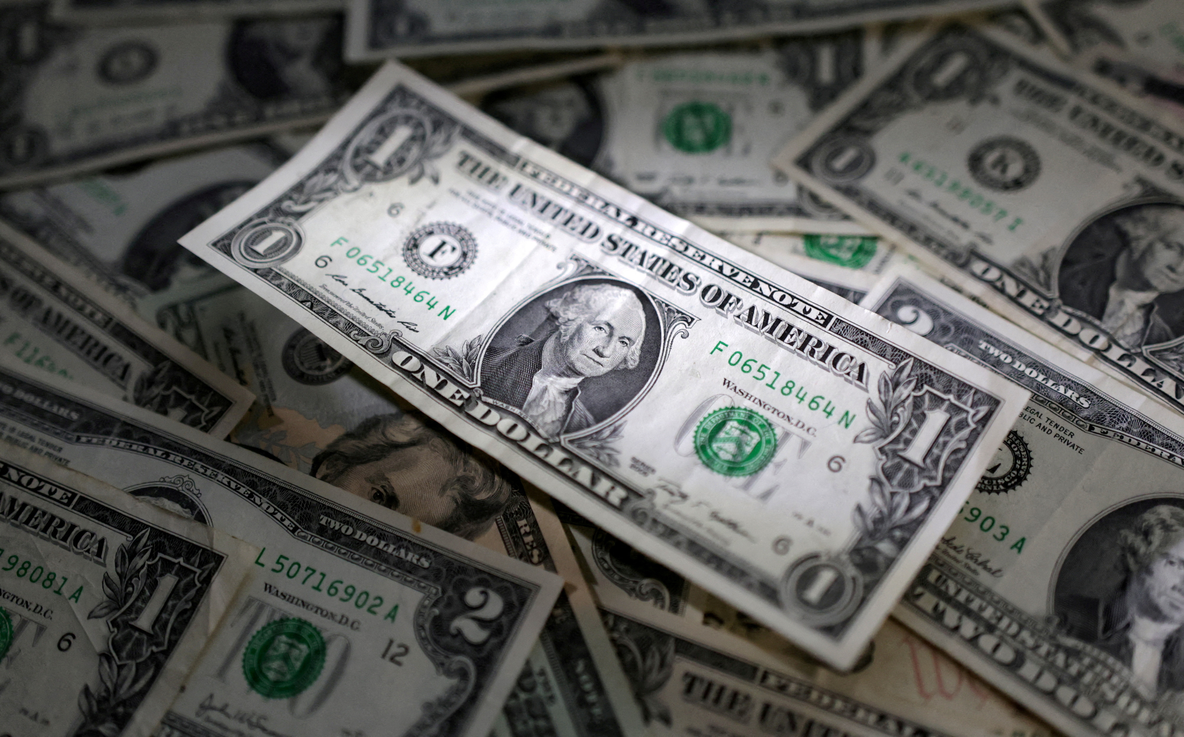 The U.S. dollar rallies as inflation worries cast doubt on Fed rate cuts compared to other banks.
Image Source: Reuters