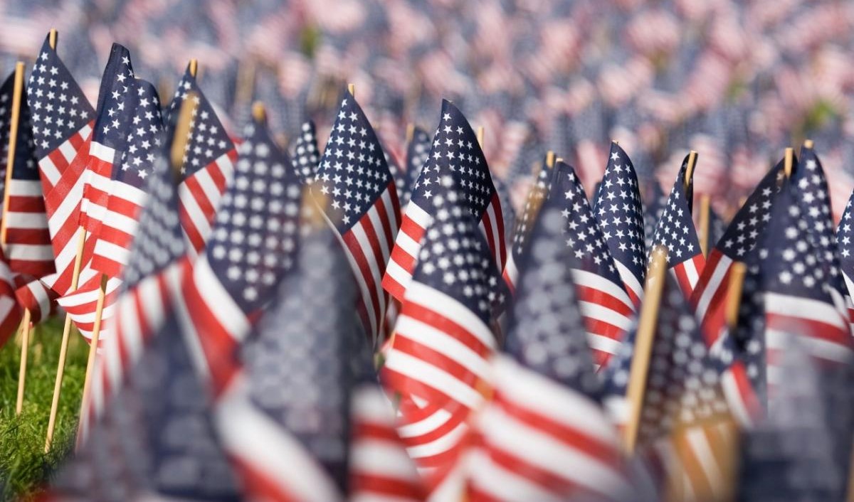 Many US flags which shows the economy of America such as GDP and PMI Index