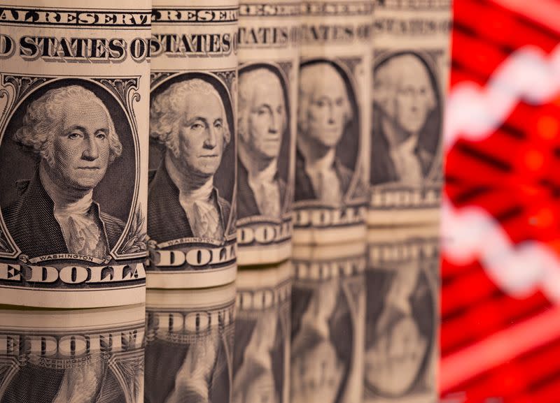 DP News - Current Affairs - Dollar grinds lower on bets U.S. tapering remains distant