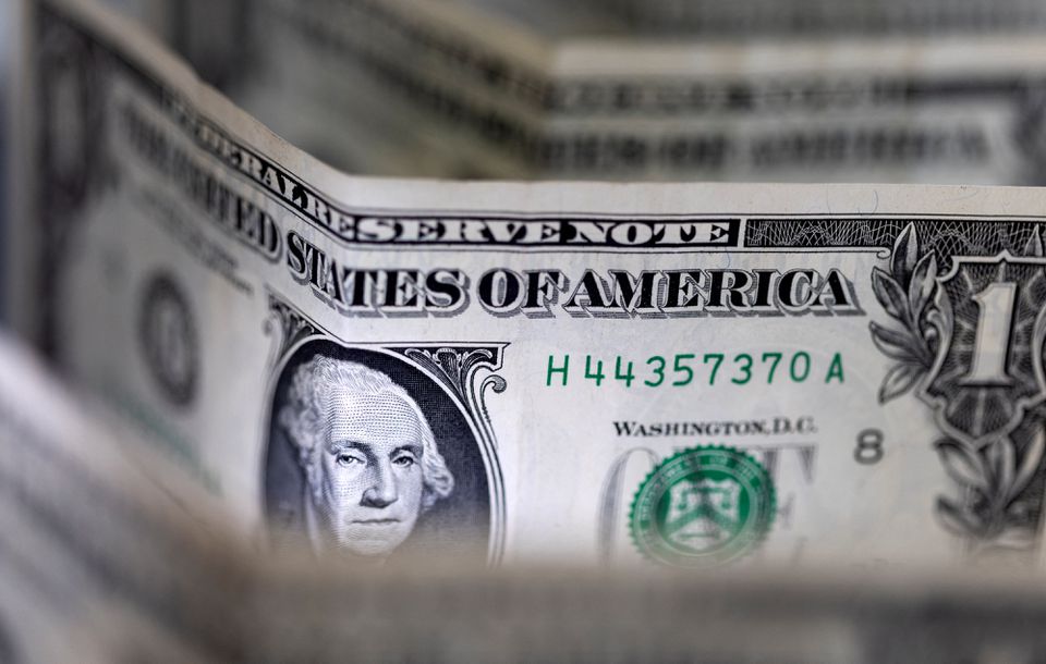 Dollar towering, stocks cowering as Fed flags more hikes